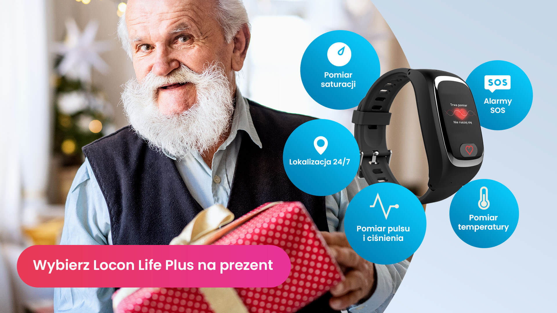 Starszy mężczyzna z siwą brodą, trzymający w dłoniach spakowaną na prezent opaskę SOS Locon Life Plus